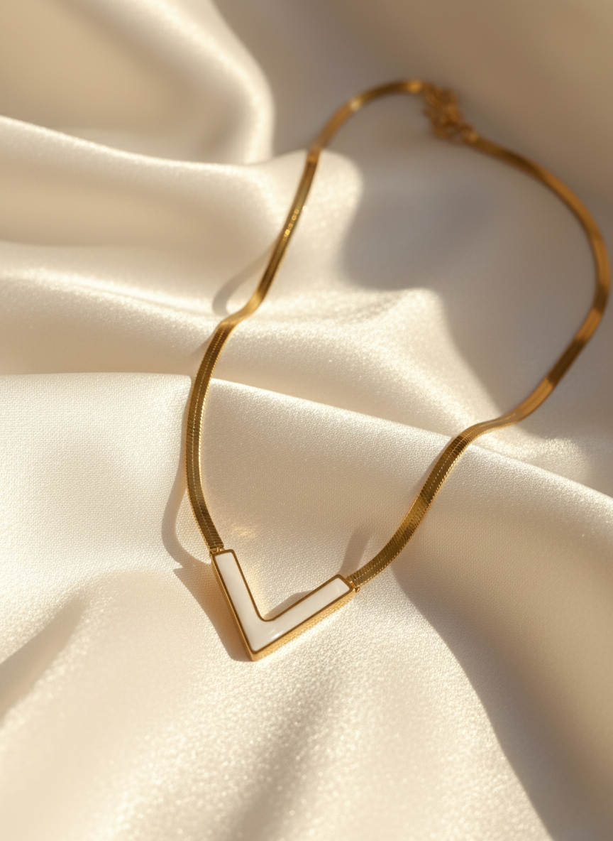 V white necklace